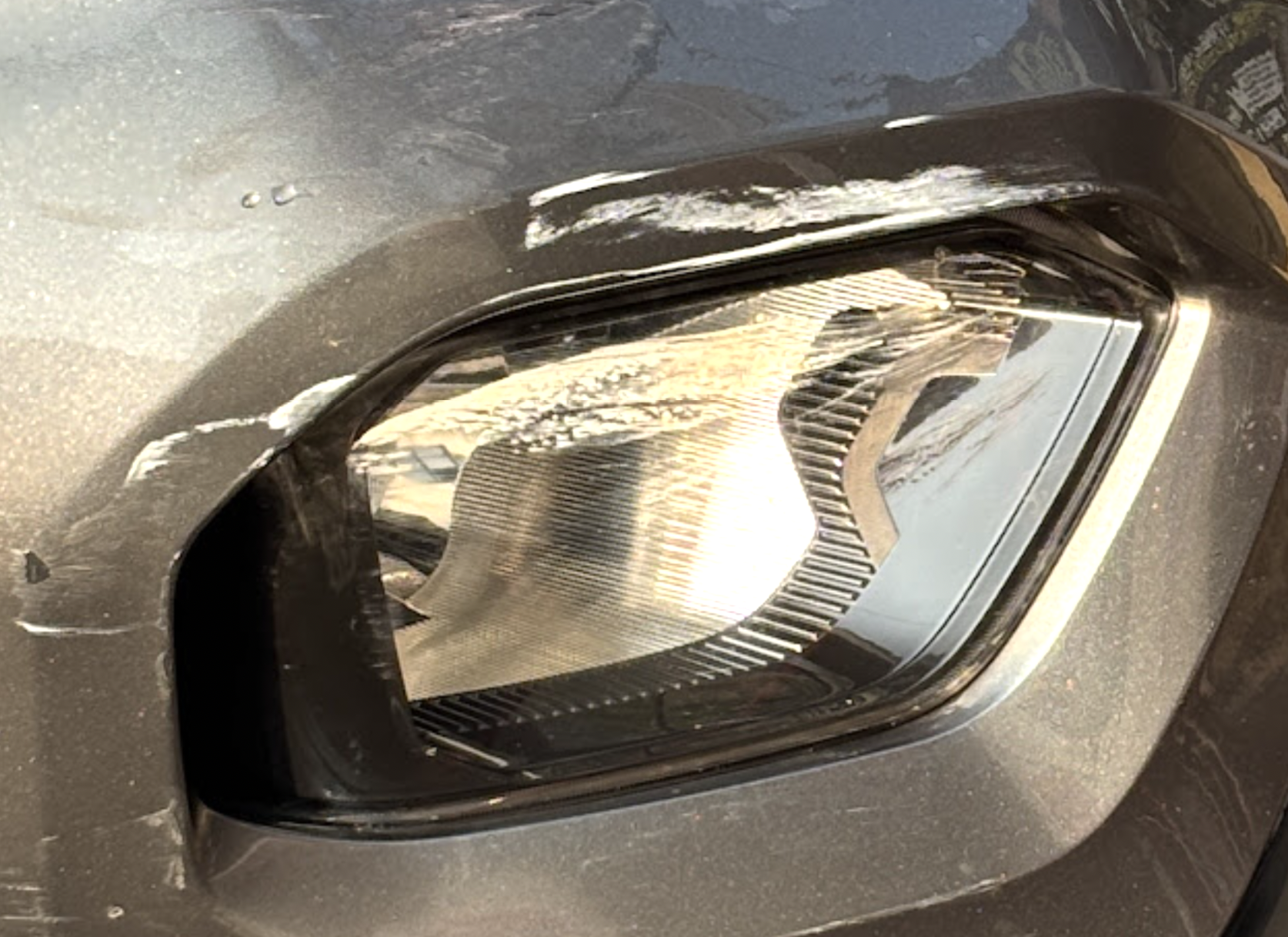 Before - Foggy/Yellowed Headlight Lens